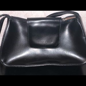 Black Tiffany and Fred purse. Excellent condition.